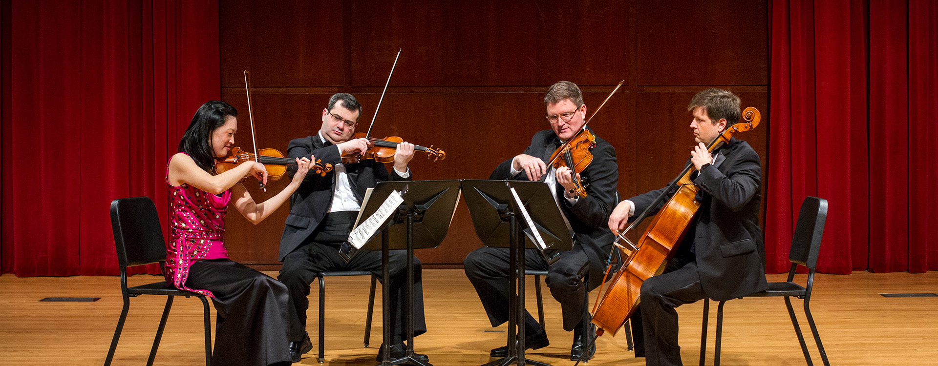 Philomusica Quartet on Schwan Concert Hall stage with instruments